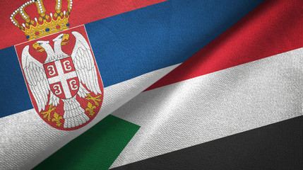 Serbia and Sudan two flags textile cloth, fabric texture