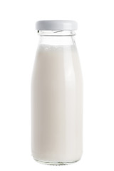 Milk in glass bottle isolated on white background.