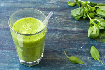 Fresh green smoothie with ingredients. Healthy food vegetables and fruits.