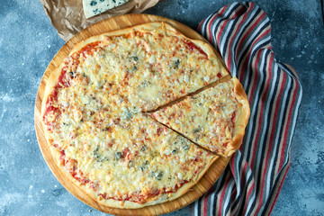 Slice of hot pizza large cheese lunch or dinner crust seafood meat topping sauce. with bell pepper...