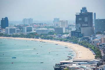 Bay area with beach sea with ferry boat and tourist travel view landmark in the Pattaya city
