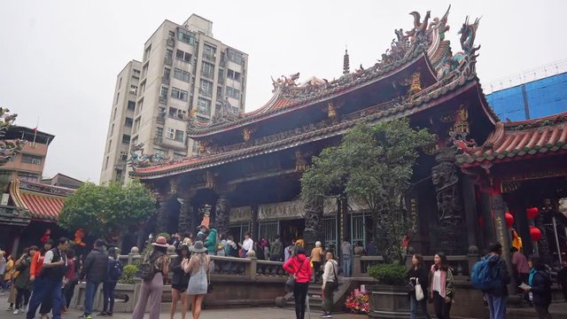 Video time lapse of Inside of Longshan Buddhist temple, This place is famous tourist spot, landmark temple in taiwan, Taiwan February 28 2019.