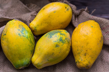 fresh papaya on sackcloth background