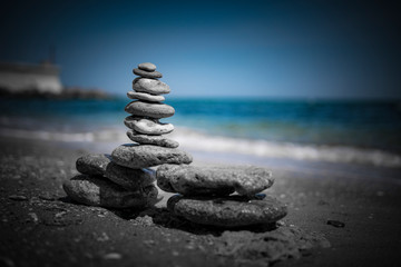 cairn on sea background. pyramid