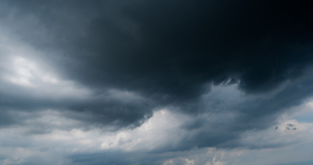 Obraz premium dark storm clouds with background,Dark clouds before a thunder-storm.