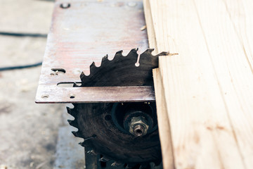 Carpentry machine electronic table saw, sharp cut metal steel silver, retro concept.