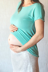 Pregnan woman cropped portrait.