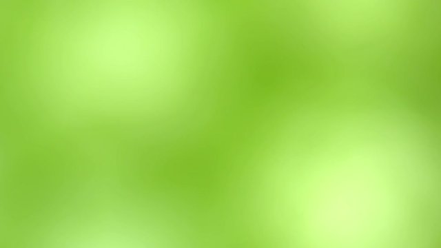 Abstract green background with visual illusion and color shift effects.
