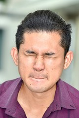 Obraz premium A Stressful Asian Man