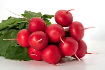 Red radish bunch on white background