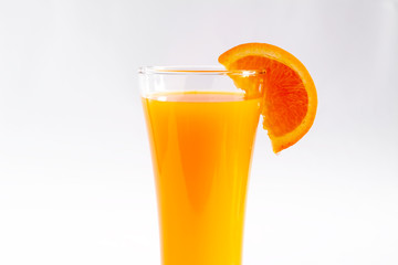 Orang juice in a glass white background