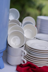 White ceramic coffee cup on the table for social event.