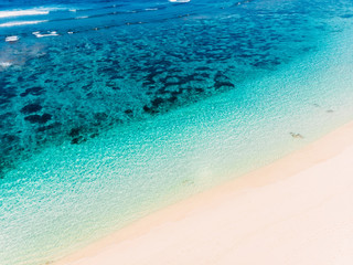 Beautiful tropical beach with blue ocean, aerial view