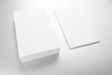 Mockup of business cards on white textured paper background