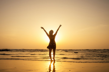 lady alone at the beach, sunset meeting Goa beach India