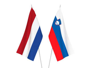 National fabric flags of Slovenia and Netherlands isolated on white background. 3d rendering illustration.