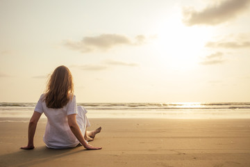 lady alone at the beach, sunset meeting Goa beach India