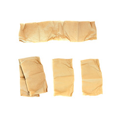 torn brown tissue paper on white background