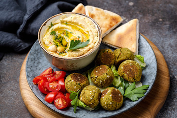 Falafel, hummus and pita bread appetizer. Arabian or vegetarian cuisine