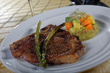 Grilled T-Bone steak with vegetables