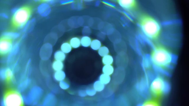 4K Abstract technology neon lines tunnel. Camera rotates and moves forward towards the white light. Dynamic background for project.