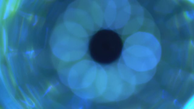 4K Abstract technology neon lines tunnel. Camera rotates and moves forward towards the white light. Dynamic background for project.