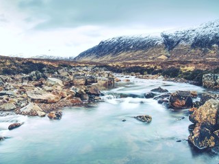 Spring river in Scottish highlands.  Dramatic landscape of Glen Coe © rdonar