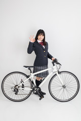制服で自転車に乗る女子高生　high school girl