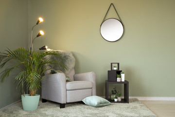 Interior of modern room with comfortable armchair