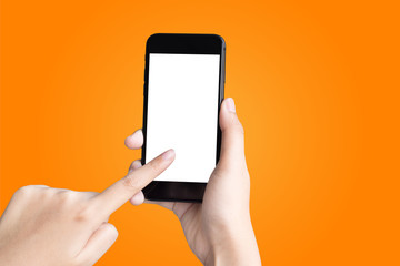 woman hand holding smartphone isolated on orange gradient background.