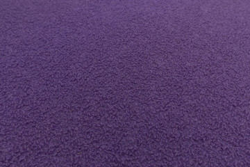 Fototapeta premium Violet fabric close up with textile texture bacground