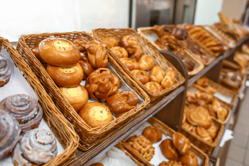 Tasty fresh bakery products in supermarket