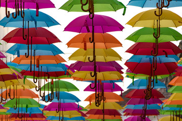 Colorful umbrellas background. Colorful umbrellas in the sky. Street decoration.