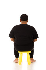 Back of obesity man on a chair isolated on white background