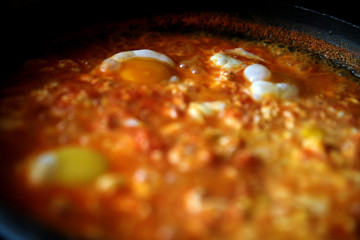 Menemen meal made with tomatoes and eggs,