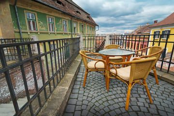 Street cafe on roof in historical center of Sibiu town