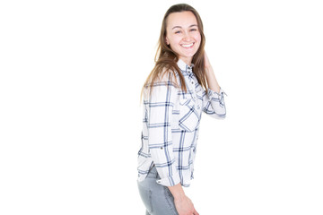 lifestyle portrait of a smiling blonde young woman with empty copy space