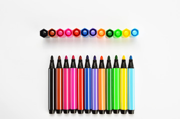 Fototapeta premium Multi colored felt tip pens on white background
