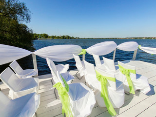 Place for wedding ceremony. Pier on bank of lake