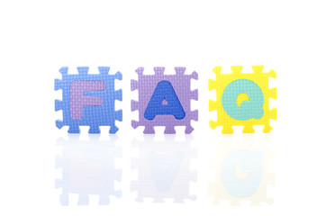 Frequently ask question concept, word faq in wordblock on white background