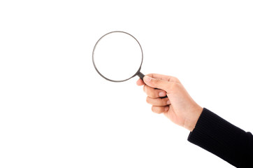 Hand holding magnifying glass isolated on white background
