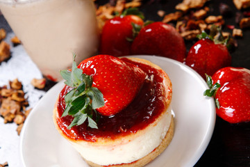 Cheese pie with strawberries and walnut.