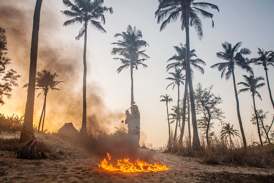 Man doing fire show at Arambol beach in India