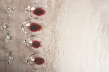 Red wine in transparent wine glasses on a betton background with space. Bojole nouveau, wine bar,...