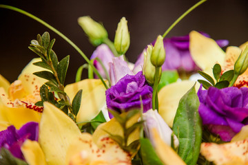 Fototapeta premium Yellow orchid bouquet in a box