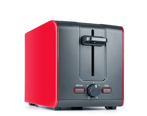 Red toaster isolated on white background. File contains a path to isolation.