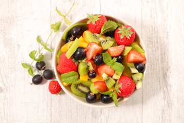 mixed fruit salad with strawberry, grape, kiwi and banana