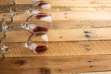 Flat lay red wine in glasses on wooden background with space, Concept of wine distillation, winery, winery, wine bar, party
