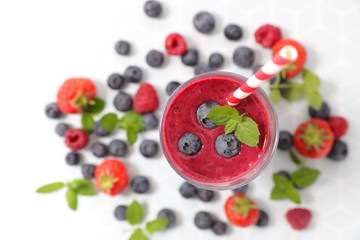 Naklejka na ściany i meble berry fruit smoothie with strawberry and blueberry