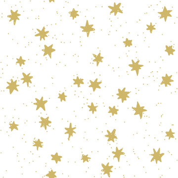 Dynamic background with hand drawn stars in gold color. Seamless vector pattern